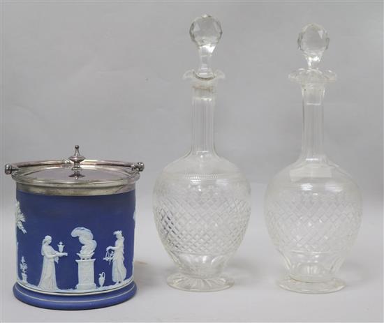A Wedgwood plated biscuit barrel and a pair of decanters